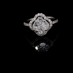 A CLOVER DIAMOND CLUSTER RING