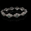 AN EMERALD AND DIAMOND BRACELET - 2