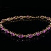 A PINK STONE AND DIAMOND SET BRACELET