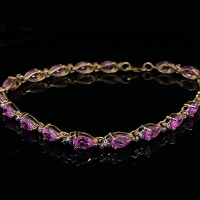 A PINK STONE AND DIAMOND SET BRACELET