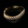 A GOLD BRACELET BY SIMYA - 3