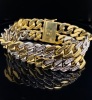 A GOLD AND DIAMOND BRACELET - 3