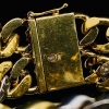 A GOLD AND DIAMOND BRACELET - 4
