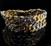 A GOLD AND DIAMOND BRACELET - 5