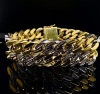 A GOLD AND DIAMOND BRACELET - 7