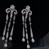 A PAIR OF GOLD AND DIAMOND DROP EARRINGS - 3