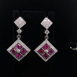 A PAIR OF RUBY AND DIAMOND EARRINGS