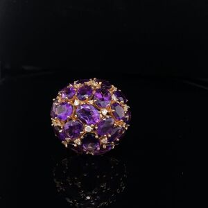 AN AMETHYST DIAMOND BOMBE RING