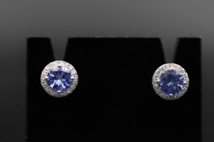 A PAIR OF TANZANITE AND DIAMOND STUDS