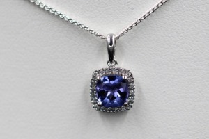 A TANZANITE AND DIAMOND PENDANT