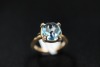 A TOPAZ AND DIAMOND RING