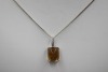 A CITRINE AND DIAMOND PENDANT