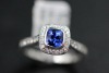 A SAPPHIRE AND DIAMOND RING