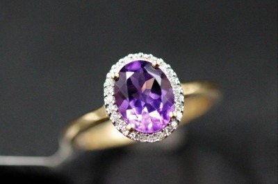 AN AMETHYST AND DIAMOND RING