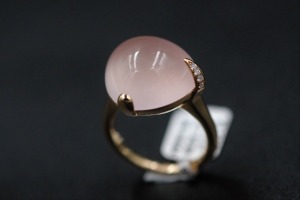 A ROSE QUARTZ AND DIAMOND RING