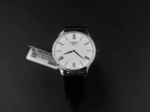 A TISSOT TRADITION WRISTWATCH