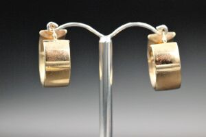 A PAIR OF HOOP EARRINGS