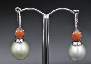 A PAIR OF SOUTH SEA PEARL AND JADE EARRINGS