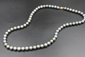 A LONG STRAND OF TAHITIAN PEARLS