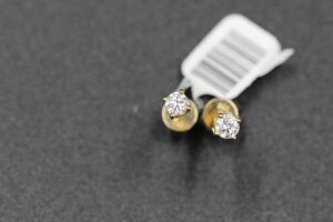 A PAIR OF DIAMOND STUDS