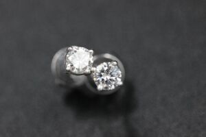 A PAIR OF DIAMOND STUDS