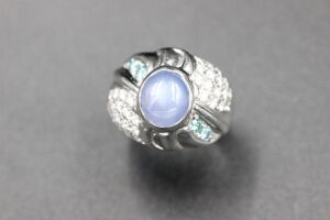 A STAR SAPPHIRE AND DIAMOND RING