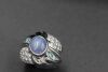 A STAR SAPPHIRE AND DIAMOND RING - 2