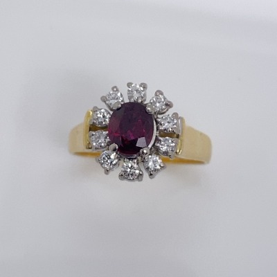 A RUBY AND DIAMOND CLUSTER RING