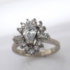 A DIAMOND CLUSTER RING - 3