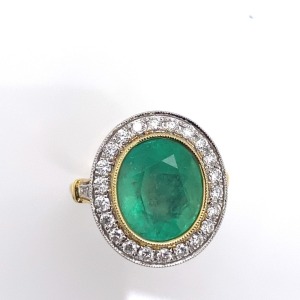 A COLOMBIAN EMERALD AND DIAMOND RING