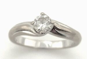 A SOLITAIRE DIAMOND RING