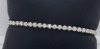 A DIAMOND TENNIS BRACELET - 2