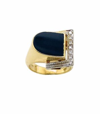 AN ONYX AND DIAMOND BUCKLE RING