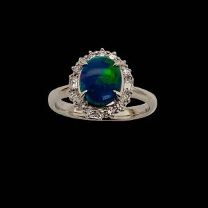 AN OPAL AND DIAMOND CLUSTER RING