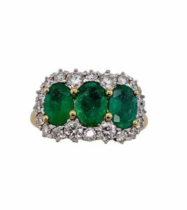AN EMERALD AND DIAMOND TRILOGY RING