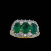 AN EMERALD AND DIAMOND TRILOGY RING - 3