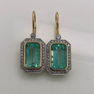 AN IMPRESSIVE PAIR OF COLOMBIAN EMERALD AND DIAMOND EARRINGS