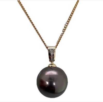 A TAHITIAN PEARL AND DIAMOND PENDANT