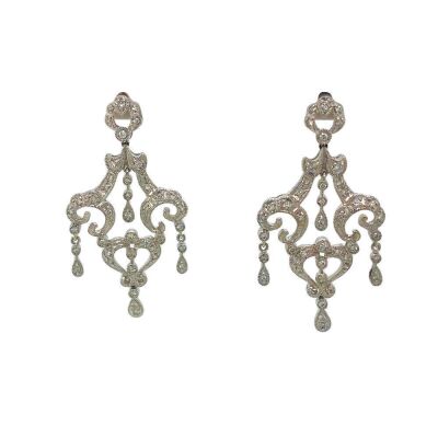 A PAIR OF DIAMOND EARRINGS