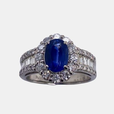 A SAPPHIRE AND DIAMOND RING