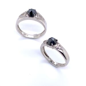 A PAIR OF BLACK DIAMOND RINGS