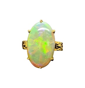 AN IMPRESSIVE OPAL AND DIAMOND RING