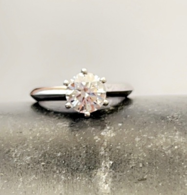 A SOLITAIRE DIAMOND RING BY JANAI