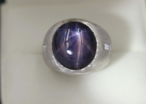 A FRENCH PLATINUM STAR SAPPHIRE RING