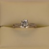 A SOLITAIRE DIAMOND RING