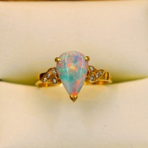 A VINTAGE OPAL AND DIAMOND RING