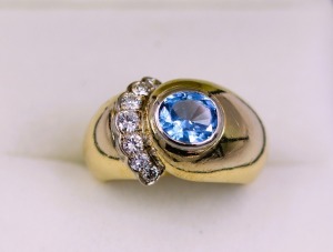 A MID-CENTURY SPINEL AND DIAMOND RING