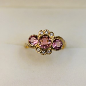 A PINK TOURMALINE AND DIAMOND RING