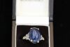 A LARGE CABOCHON SAPPHIRE AND DIAMOND RING - 2