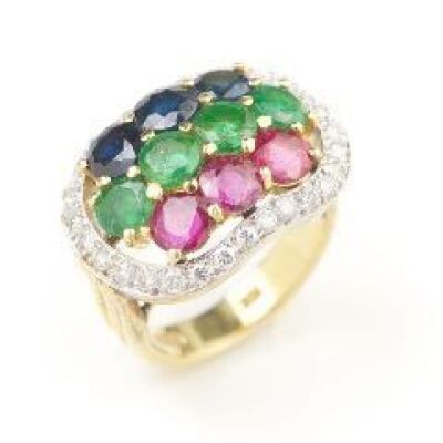 A RUBY, EMERALD AND SAPPHIRE RING